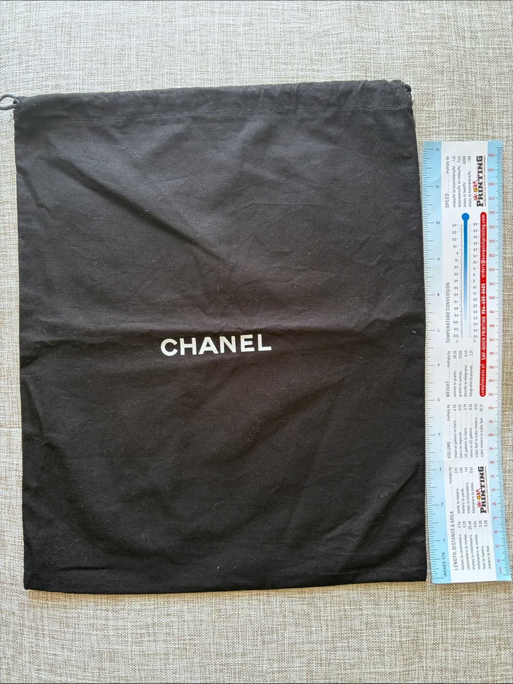 CHANEL Black with White Logo Drawstring Dust Bag